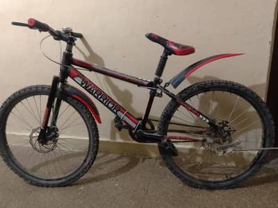 “Warrior Mountain Bike 26” – Strong Frame, Disc Brake, Good Condition”