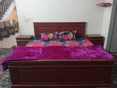 Bed with side tables