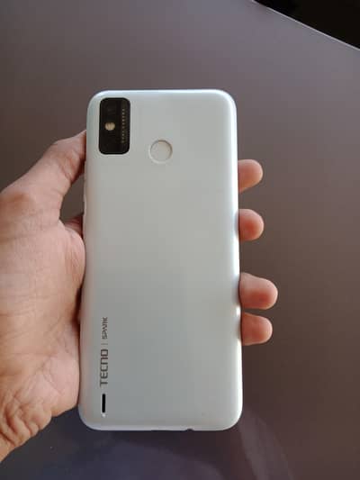 argent for sale Tecno spark 6 go with charger and tow cover