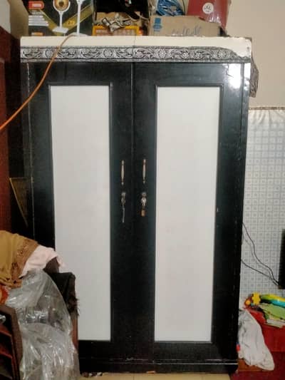 2 dor wood almari asal lasani lakri mein ha  full size almari ha