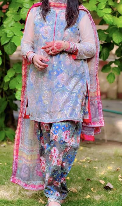Beautiful lawn with fancy net kameez shalwar