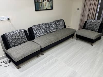 lavish and modern grey and black sofa set