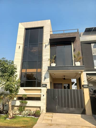 DOUBLE UNIT BRAND NEW 5 MARLA ELEGANT AND FULLY MAINTAINED SUPER HOT LOCATED BUNGALOW IS AVAILABLE IN THE BEST BLOCK OF DHA LAHORE.