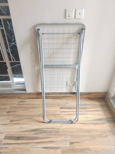 Foldable clothes drying stand