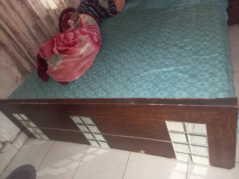 Bed without mattress and one side table 1