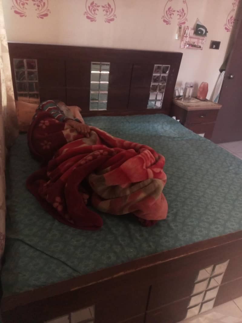 Bed without mattress and one side table 2