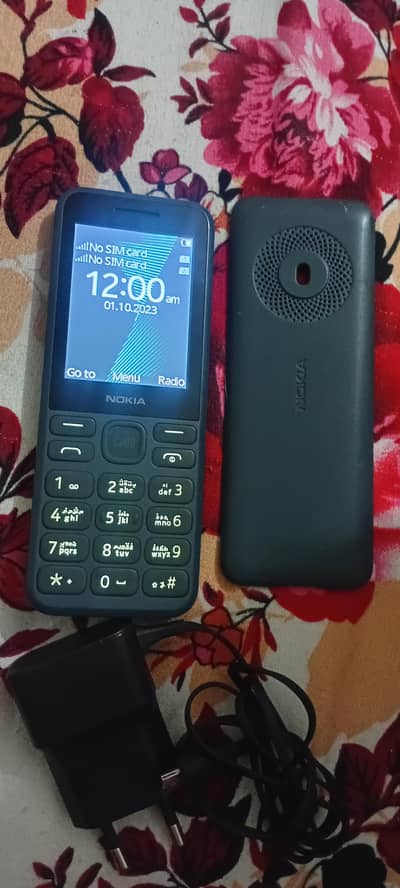 Nokia 125,sath charger(03196263276),new modle,dua sim,pta aproved