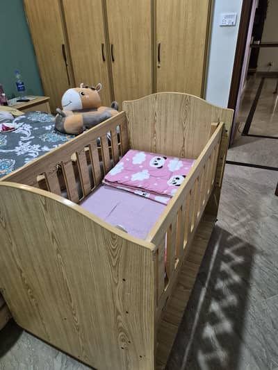 Wooden baby cot