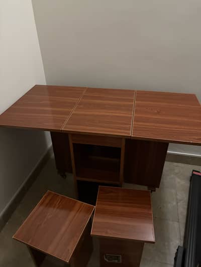 Folding dining table with 4 stools