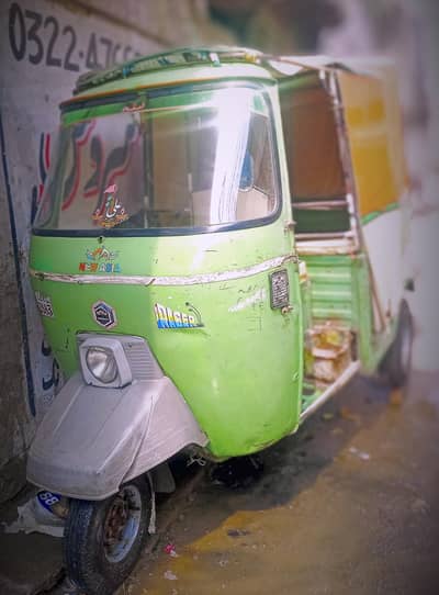 new Asia  riksha  323 2228884