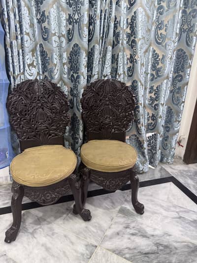 Wooden chairs and set of centre table