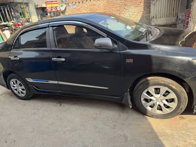 Toyota Corrola 2010 XLI Convert in GLI 2012 Black Beauty