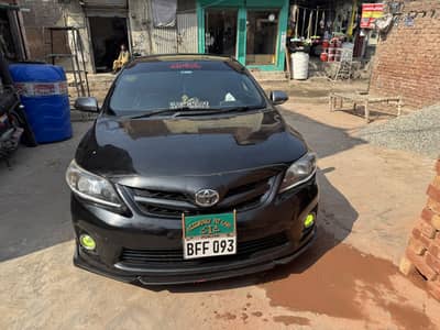 Toyota Corrola 2010 XLI Convert in GLI 2012 Black Beauty