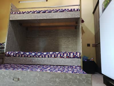 TRIPLE BED HIGH QUALITY ON DOIBLE SHEET  ONLY 2.5 YEARS USED NO DAMAGE