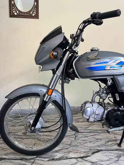 Honda cd 70 dream silver colour brand new condition only 2410 km drive