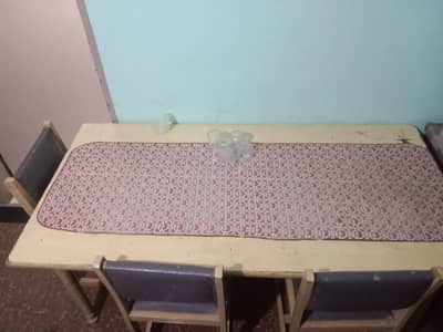 wooden table and chairs