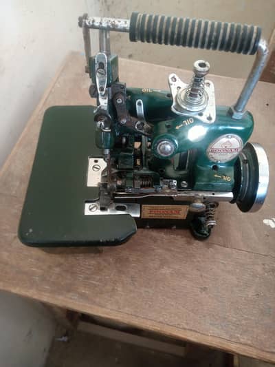 over lock Poonam machine