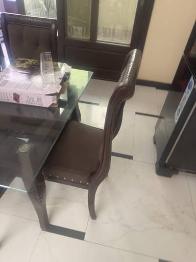 Dinning table for sale 10/8 condition. 6 chairs hai sheesham wood hai