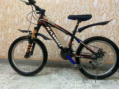 Rainbow MTB Cycle – Rideable & Colorful, Needs Maintenance