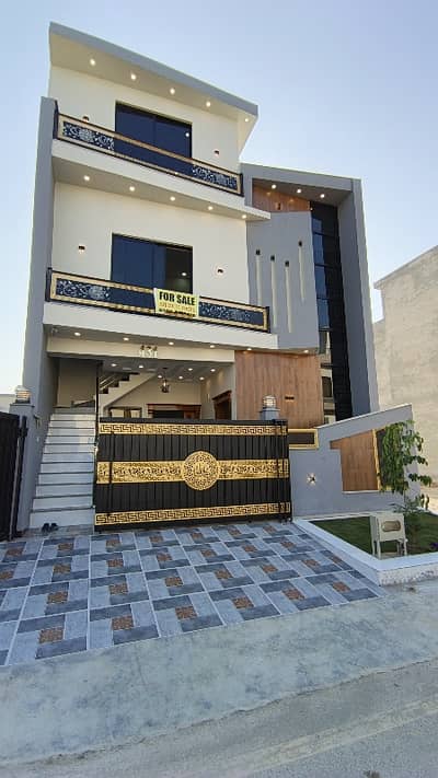 *5 Marla Luxury House for Sale in Faisal town Islamabad Your Dream Home Awaits!* Located in a premium gated society with _all modern amenities_, this stunning 5 Marla residence is priced at *Rs:2.85 Cr* perfect for those who value elegance, comfort & status.