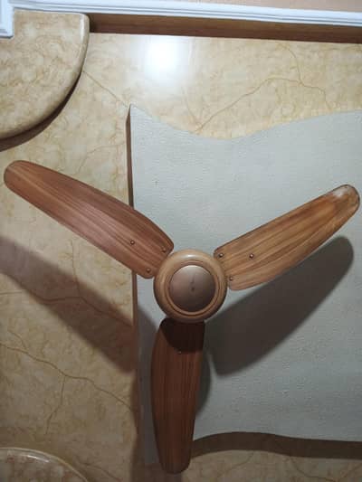 Royal Fan  for sale in used condition at best price (wooden Colour)