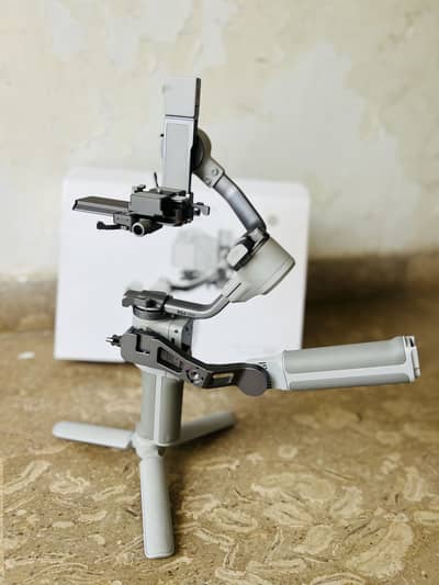 Dji Rs 4 Mini With Ai Tracking Device box open just