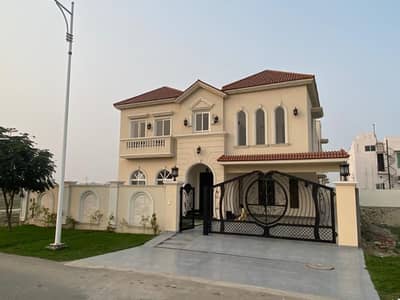 20 MARLA ELEGANT AND FULLY MAINTAINED 4 YEAR OLD SPNISH DESIGN SUPER HOT LOCATED BUNGALOW IS AVAILABLE IN THE BEST BLOCK OF DHA LAHORE.