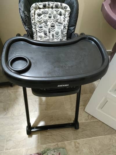 High chair available for sale