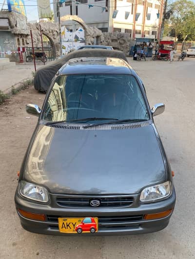 Daihatsh Coure 2006 Original auto