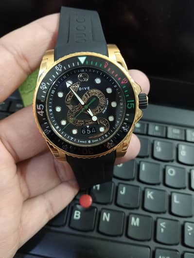Gucci Snake dial silicone strap brand new and original
