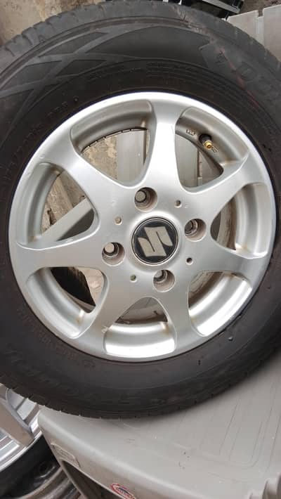 175 -70-13 Dunlap Japani tires and Rim full Condition