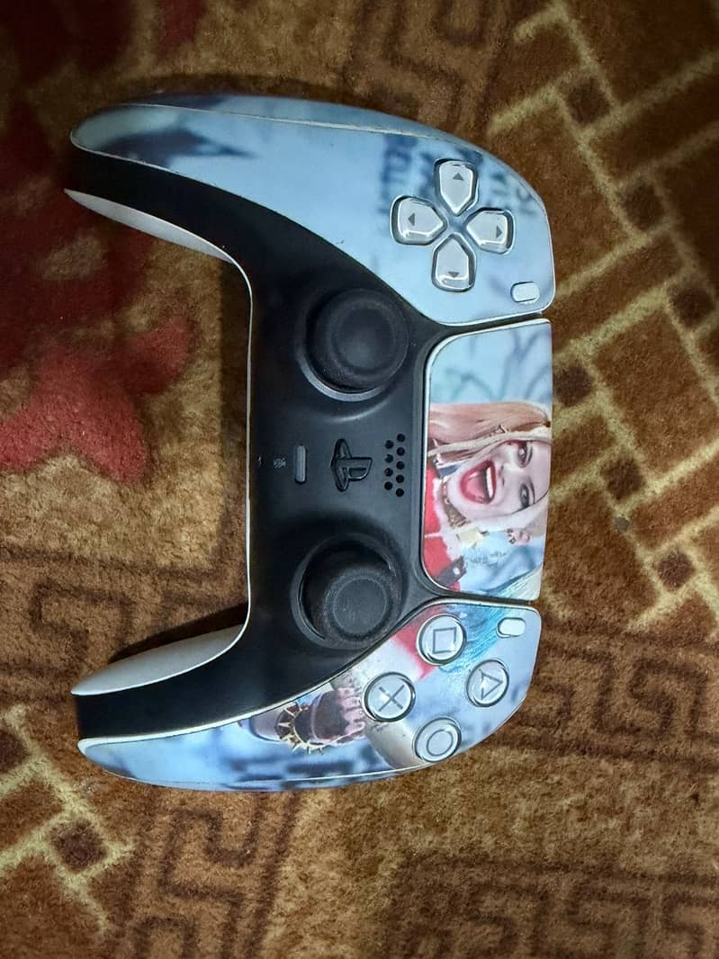 PS5 with two controllers 4