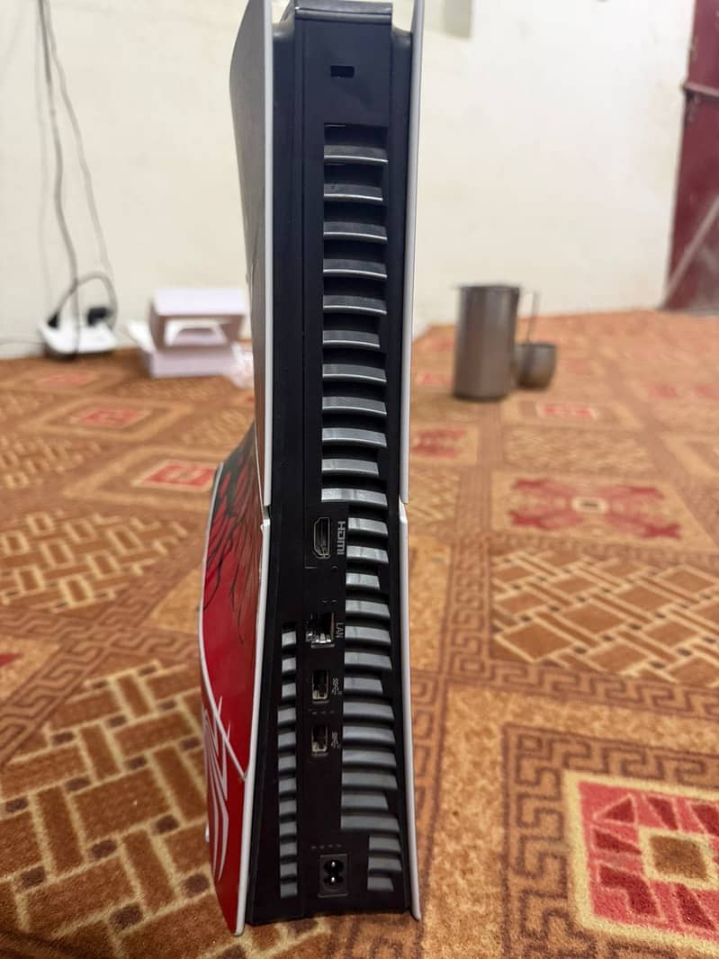 PS5 with two controllers 5