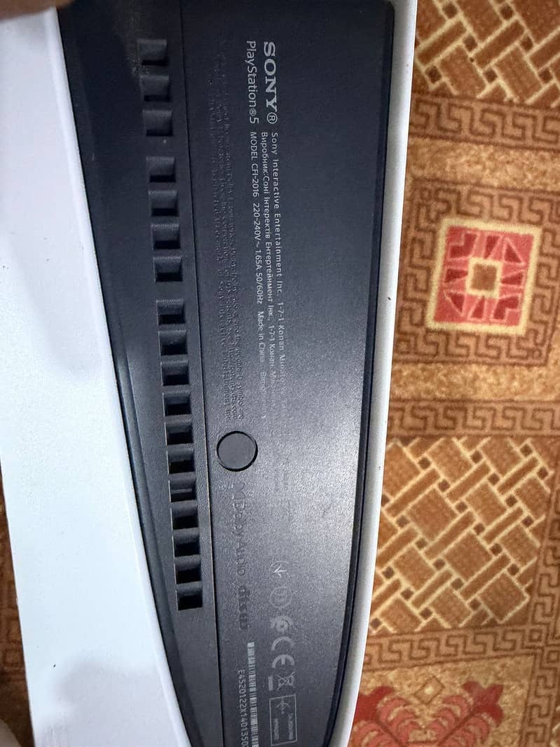 PS5 with two controllers 6