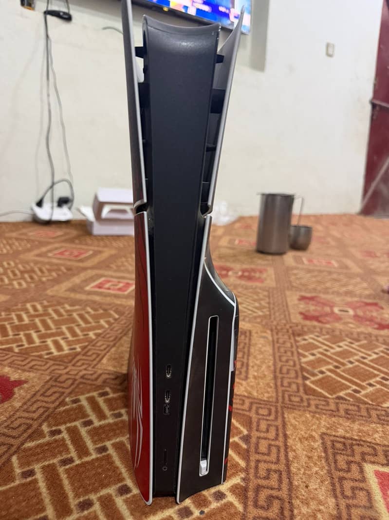 PS5 with two controllers 7