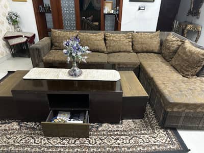 L shaped sofa and central table