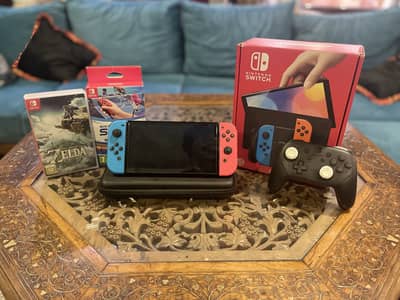 Nintendo Switch Oled with pro controllers,games,accessories
