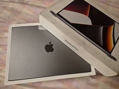 Macbook Pro 14-Inch (Hardly used, with packed accessories)