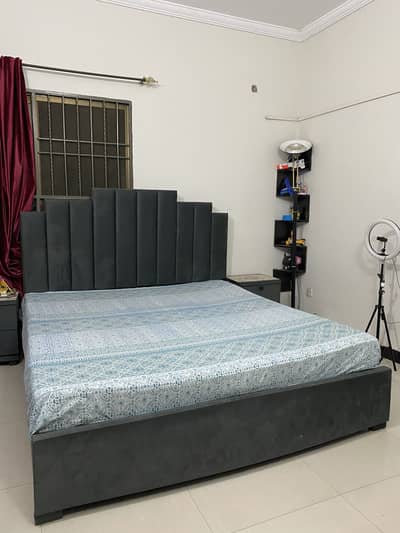 Velvet bed with side tables and dracing