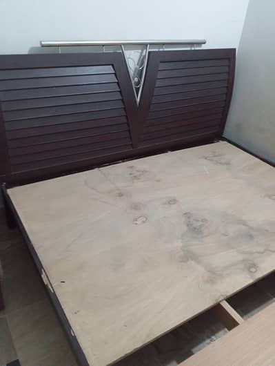 double bed and a 7 seater sofa set