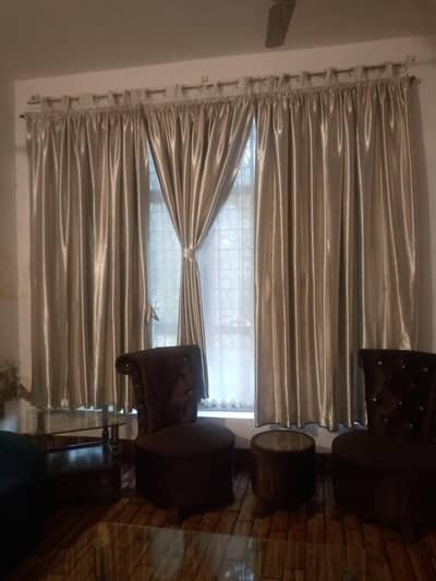 three full big window silk curtens