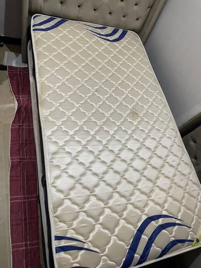 two single beds with mattress