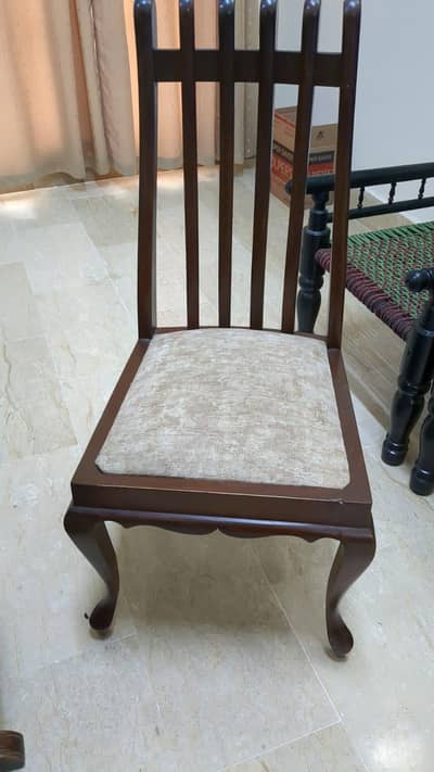 dainig table pure in wood. . .