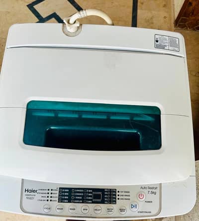 Haier 7.5kg Tap load washing mechine HWM75-918