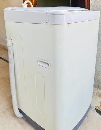 Haier 7.5kg Tap load washing mechine HWM75-918