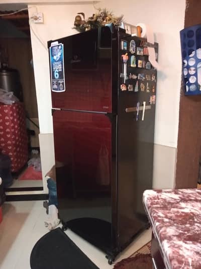 Dawlance avante model 9173 wb series almost 13cft red color reflection