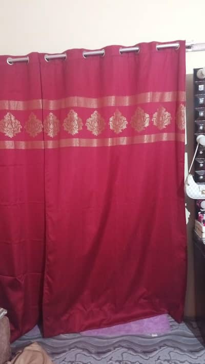 Curtains in red colour