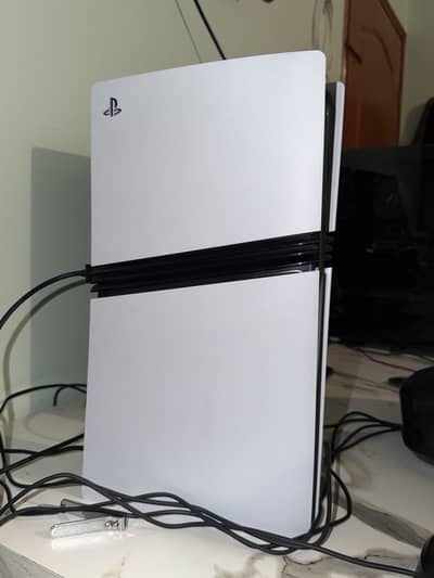 Ps5 pro with 2 controllers with controllers charger with 3 games