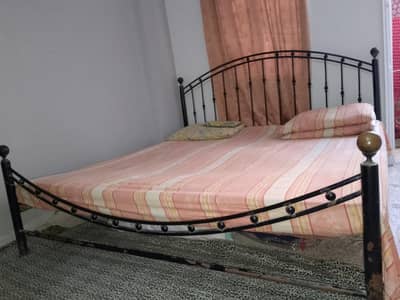 black iron double bed