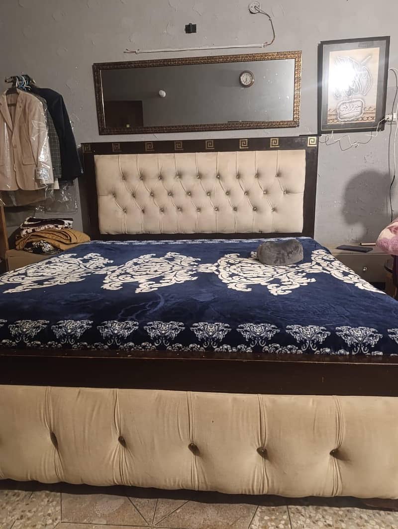 double bed with side table. 1